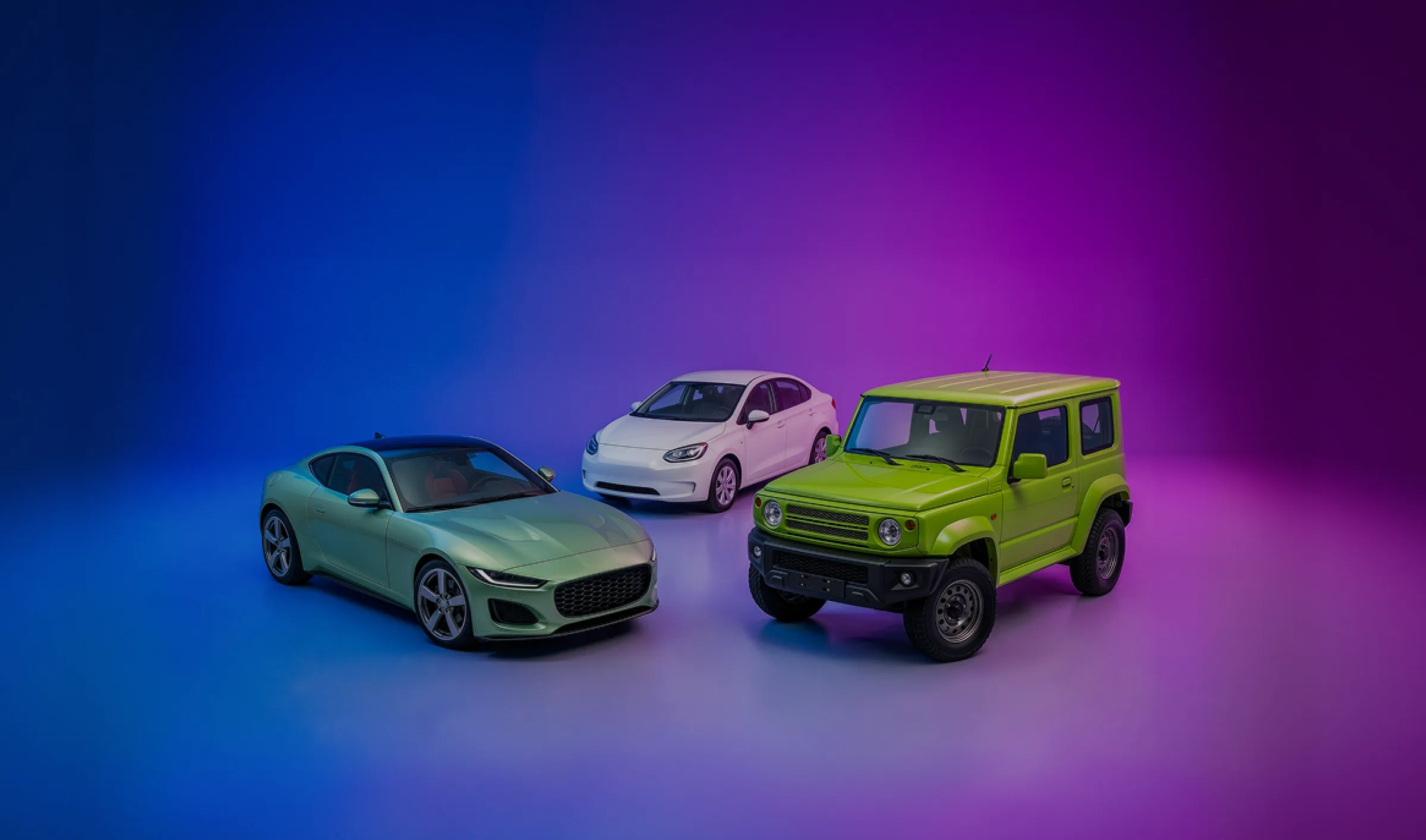 Tres autos en un estudio con iluminación azul y violeta